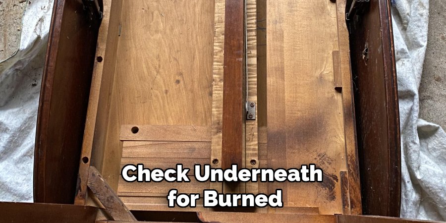 Check Underneath
for Burned