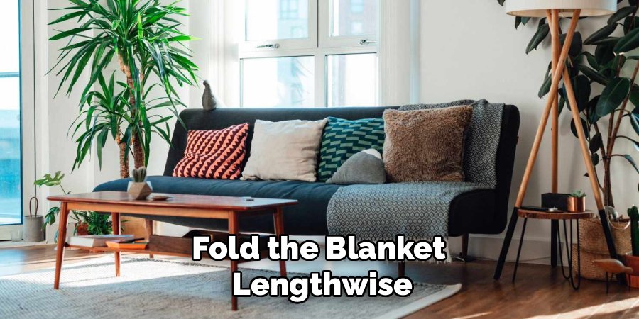 Fold the Blanket 
Lengthwise