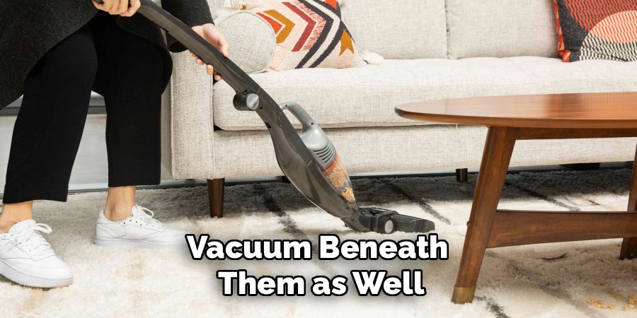 Vacuum Beneath 
Them as Well