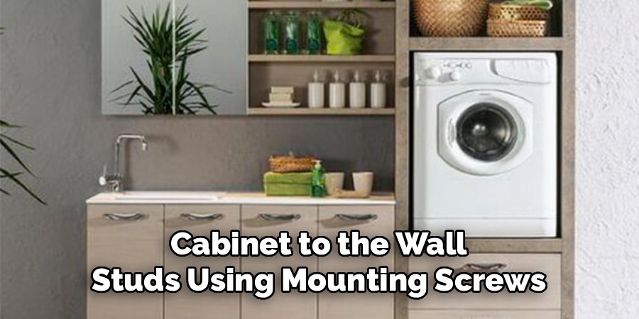 Cabinet to the Wall Studs Using Mounting Screws