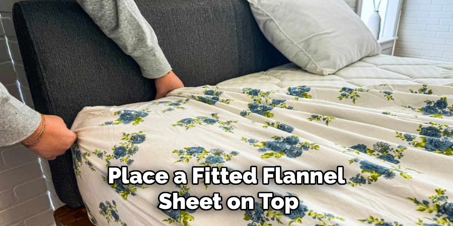 Place a Fitted Flannel
Sheet on Top