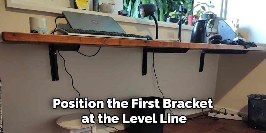 Position the First Bracket
at the Level Line