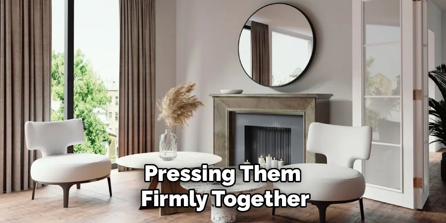 Pressing Them
Firmly Together