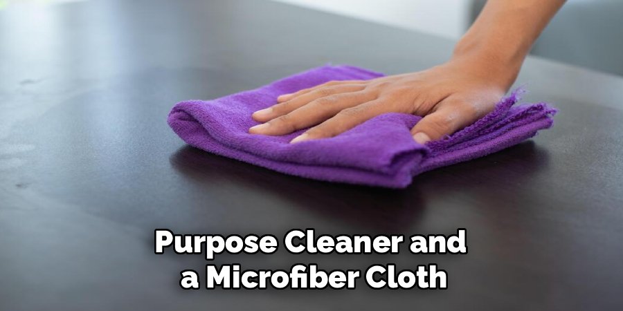 Purpose Cleaner and
a Microfiber Cloth
