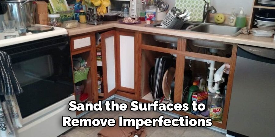 Sand the Surfaces to Remove Imperfections