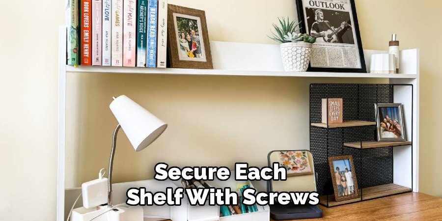 Secure Each 
Shelf With Screws