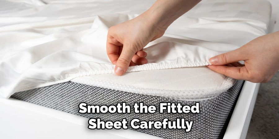 Smooth the Fitted
Sheet Carefully