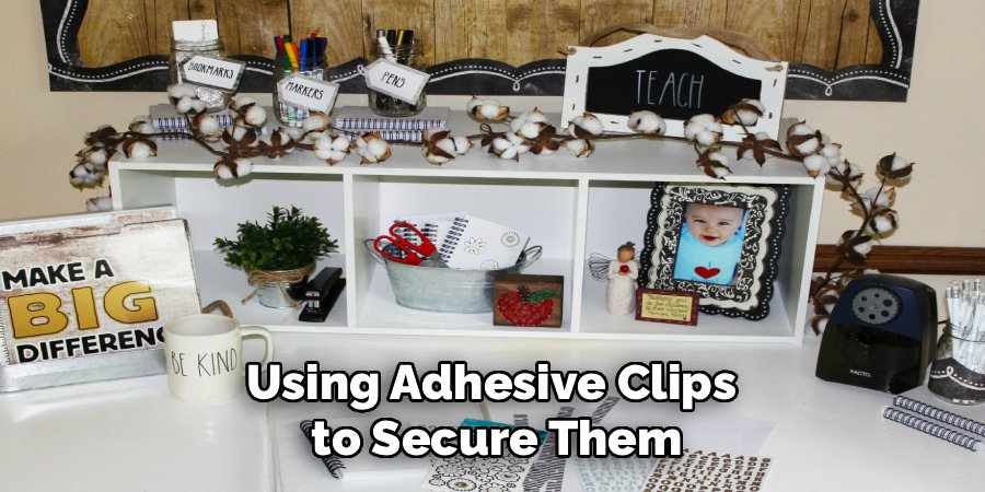 Using Adhesive Clips
to Secure Them