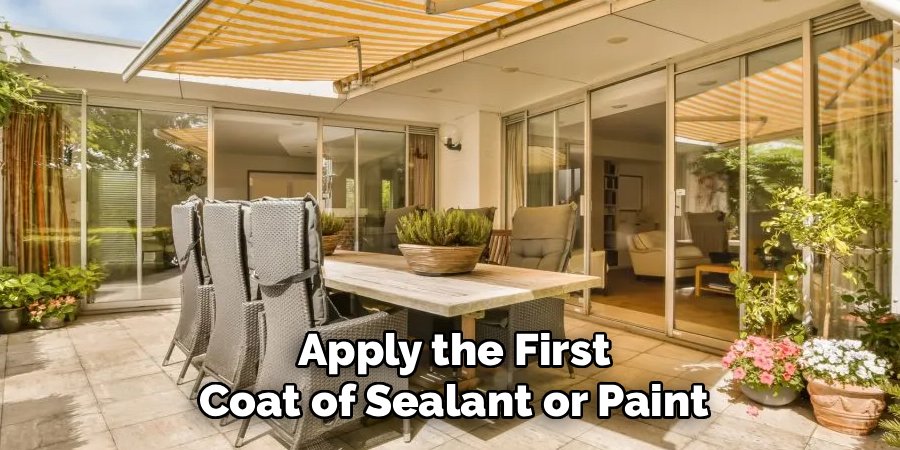 Apply the First Coat of Sealant or Paint