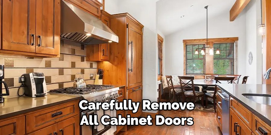 Carefully Remove All Cabinet Doors