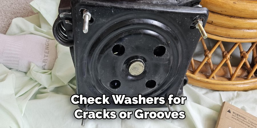 Check Washers for 
Cracks or Grooves