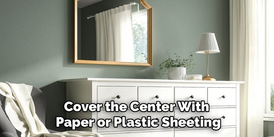Cover the Center With 
Paper or Plastic Sheeting