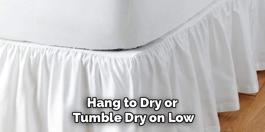 Hang to Dry or
Tumble Dry on Low
