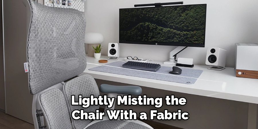 Lightly Misting the
Chair With a Fabric