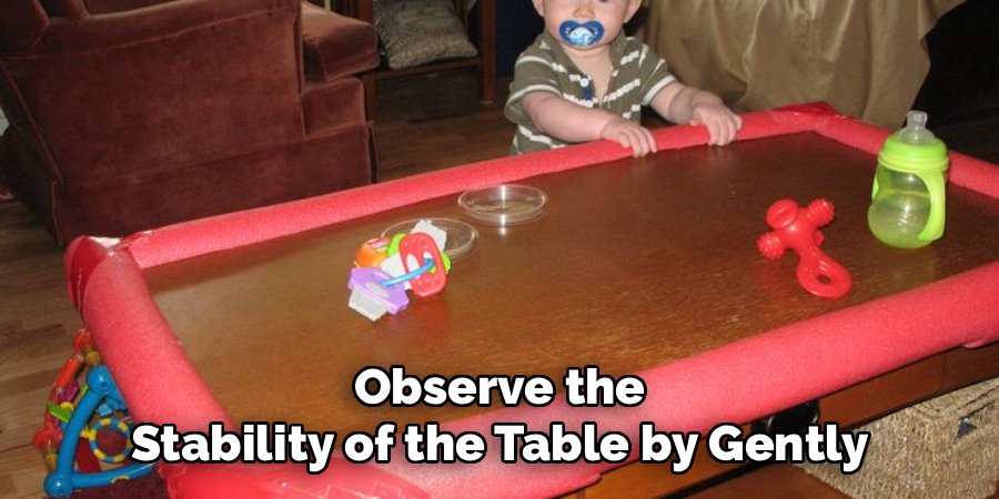 Observe the Stability of the Table by Gently