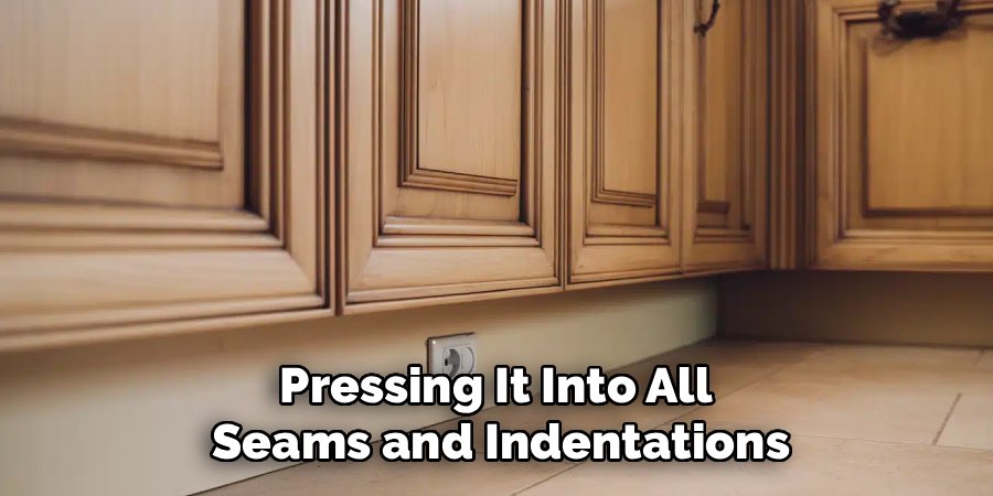 Pressing It Into All 
Seams and Indentations