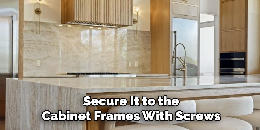 Secure It to the Cabinet Frames With Screws