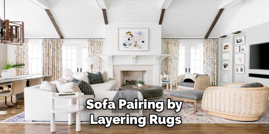 Sofa Pairing by 
Layering Rugs