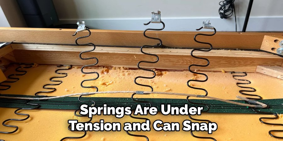 Springs Are Under 
Tension and Can Snap