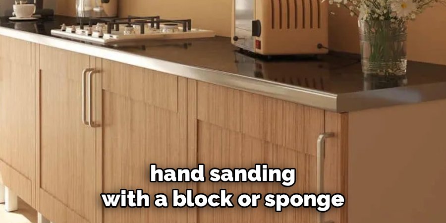 hand sanding with a block or sponge