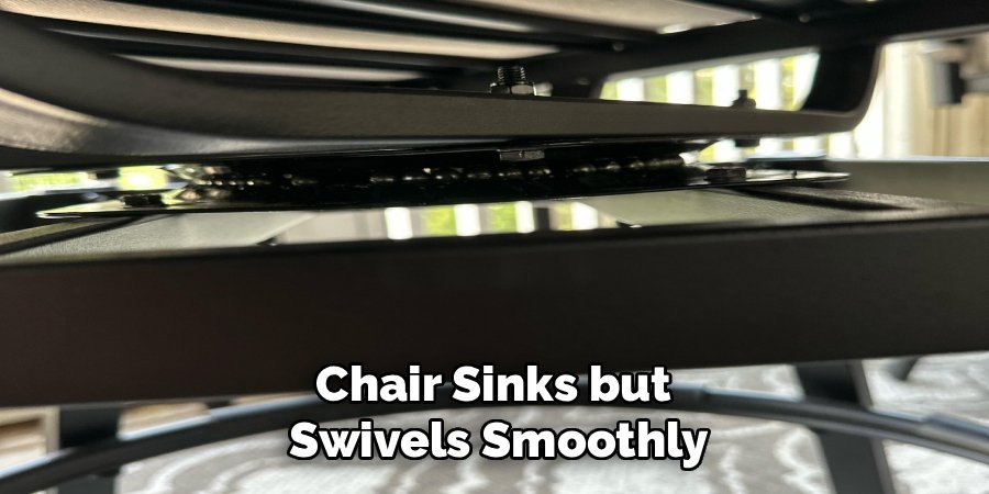 Chair Sinks but 
Swivels Smoothly